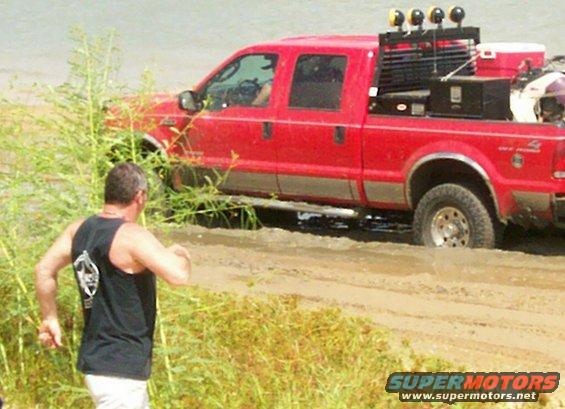 mike-about-to-add-strap-to-stuck-big-red.jpg Mike gettin' ready to strap Big Red Ford