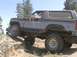 1985 Ford Bronco - This Ford Bronco is navigating a challenging off-road course.