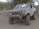 1985 Ford Bronco - Lots more to come as soon as I get the time. Solid front axle, home made brush guard, and 6 point roll cage