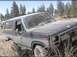 1985 Ford Bronco - This Ford Bronco appears to be from the early 1980s, with a two-tone paint scheme and large off-road tires.
