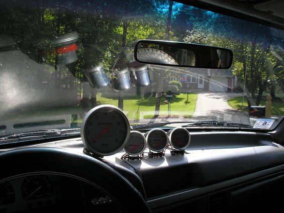 Interior view with multiple gauges on dashboard