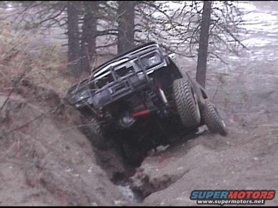 Bill trying a washed out ravine.