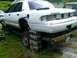 2002 Ford Crown Victoria - This 2002 Ford Crown Victoria is elevated on cinder blocks for repairs.