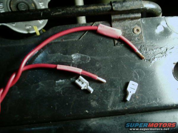 Strip the wire and slide on the heatshrink.