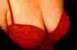 1978 Ford F-250 - Close-up view of a red bra, focusing on texture and strap.
