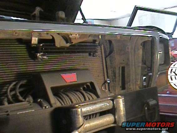 after cutting the cross member the power steering line hung down so I removed it and added a cooler.