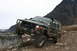 1995 Jeep Cherokee - Modified 1995 Jeep Cherokee tackling a challenging rocky trail in the mountains.