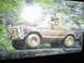 1989 Ford Bronco - Model Bronco built by John Dezan, covered in mud and posed on rocks.