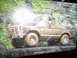 1989 Ford Bronco - This model Bronco is covered in mud, suggesting it's built for off-road adventures.