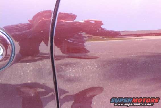 im000190.jpg Side scrapes, no big deal, little touchup paint and a wax will fix these up.