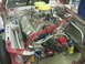 1990 Ford Mustang - Custom engine bay dual carburetors and MSD ignition components, likely for a race car.