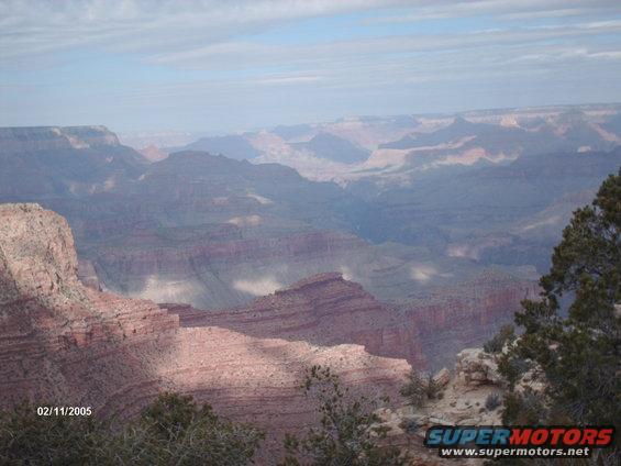 Grand Canyon landscape with date stamp 02/11/2005 and Supermotors.net logo