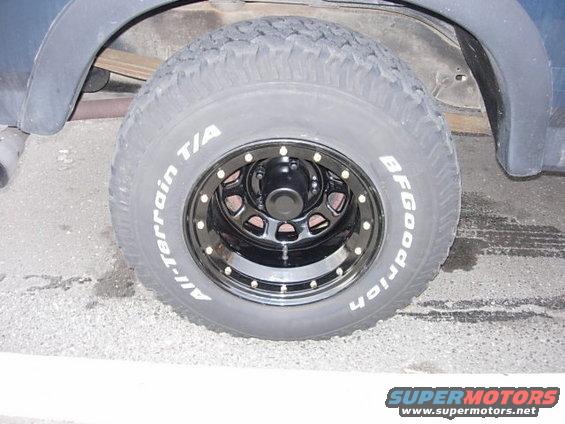 BFGoodrich All-Terrain T/A tire on black beadlock wheel