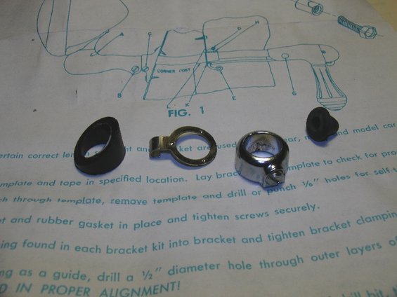 Diagram of car part installation with assorted hardware pieces laid out
