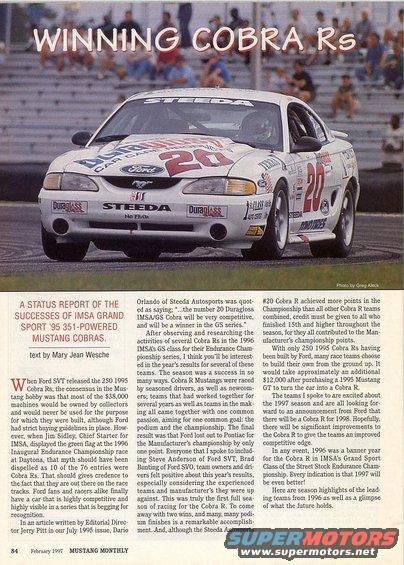 White 1995 Ford Mustang Cobra R race car with red and blue decals, number 20, on a track