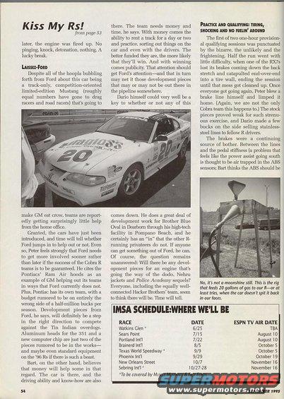 White 1994 Ford Mustang race car with racing decals and the number 20 on the door, angled from the front