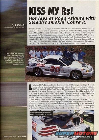 White Ford Mustang race car with 'Duragloss' and '20' decals, crew standing beside it