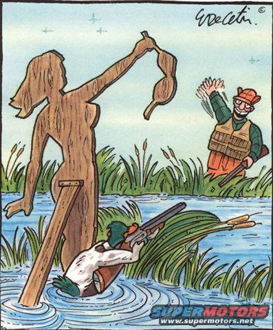 Duck hunters in marsh with a wooden female decoy holding a bra