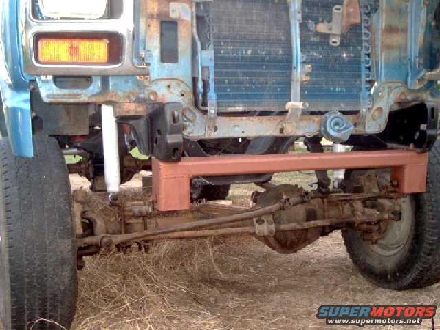 Trimmed 3/8" off front of F350 leaf springs to fit crossmember