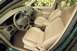 2002 Ford Focus - Interior view of a 2002 Ford Focus, highlighting the dashboard and tan leather seats.