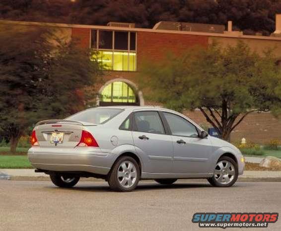 Silver 2002 Ford Focus sedan, rear view. Badge visible
