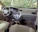 2002 Ford Focus - Interior view of a 2002 Ford Focus, highlighting the dashboard and controls.