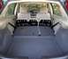 2002 Ford Focus - The spacious cargo area of a 2002 Ford Focus ZX5, with the rear seats folded down for maximum storage.