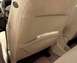 2002 Ford Focus - A map is tucked into the seatback pocket of a car's interior.
