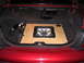 2003 Ford Crown Victoria - Trunk of a 2003 Ford Crown Victoria showing a custom subwoofer and amplifier installation.