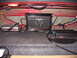 2003 Ford Crown Victoria - Aftermarket car audio equipment installed in the trunk of a vehicle.