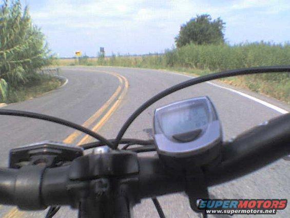 Bicycle handlebars with digital display on a country road