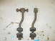 1995 Jeep YJ - Two rusty sway bar end links, likely for an older Jeep, are shown against a plain background.