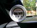 2003 Mercury Marauder - An aftermarket digital gauge is mounted on the dashboard, with a view of the outdoors through the windshield.