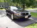 2003 Mercury Marauder - This black 2003 Mercury Marauder is parked in a residential driveway on a sunny day.