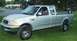 1997 Ford F-250 - This silver 1997 Ford F-250 pickup truck is shown from a three-quarter front angle.