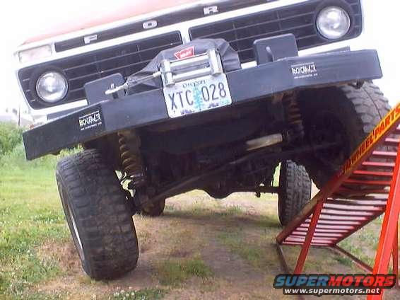 1976 Ford F-100 front end with winch mounted on custom bumper. Oregon license plate XTC 028 visible