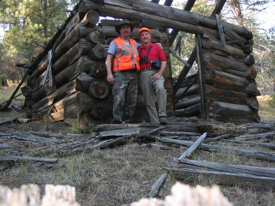 111_1161.jpg Me and the Pops in front of an old shack in the woods