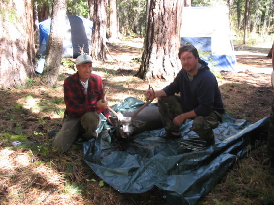 111_1182.jpg Cousin (who is a WA. State forest ranger) and I.  We teamed up to bring down this Mule Deer.