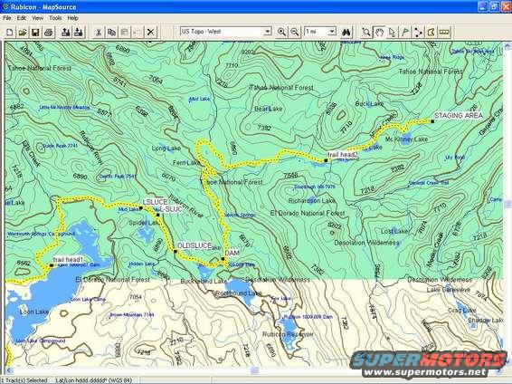 Computer screen showing a topographic map with trails and lakes, watermarked with SUPERMOTORS.NET