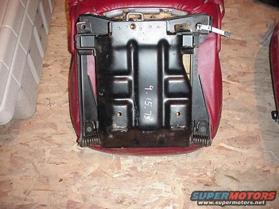 Red car seat base with date 9.15.78 stamped on metal