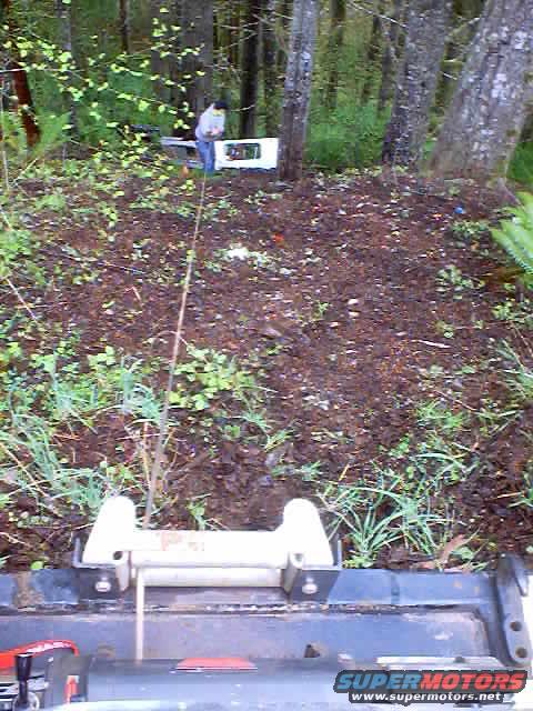 Roger hooks me up to an old canopy.  Tries to come apart on us, but we got all of it.