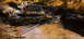 1979 Ford Bronco - This 1979 Ford Bronco is struggling to get through a muddy off-road obstacle.