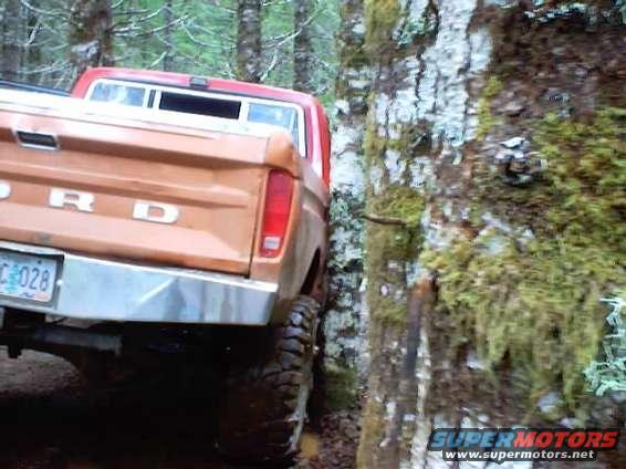 1976 Ford F-100 rear view, orange, off-roading