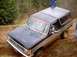 1976 Ford F-100 - This black Ford Bronco appears to be from the early 1980s, not a 1976 F-100, as it is stuck in the mud.