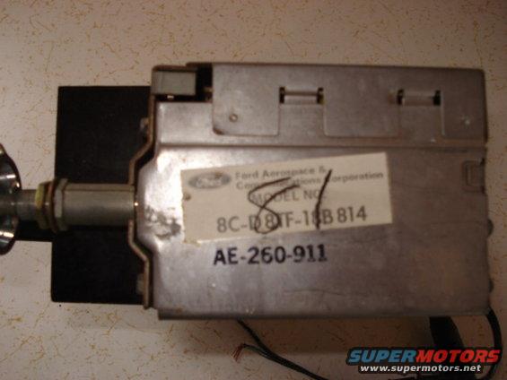 Ford radio module with label showing model number 8C-18B814 and AE-260-911