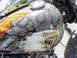 1999 Harley-Davidson Fat Boy - Custom painted motorcycle gas tank features an eagle's head and feathers with a rocky texture and chrome accents.