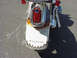 1999 Harley-Davidson Fat Boy - Motorcycle fender features custom eagle feather paint and Harley-Davidson branding.