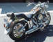 1999 Harley-Davidson Fat Boy - A custom painted Harley-Davidson motorcycle is shown from the rear three-quarter view.