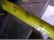 1988 Ford C-350 (Centurion Conversions) - A close-up of a yellow measuring tape with visible markings and numbers.