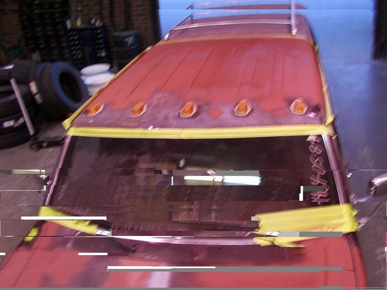 1988 Ford C-350 (Centurion Conversions) cab roof with amber marker lights and yellow tape on windshield